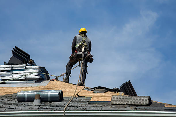 Professional Roofing technician working in Sheldonville, MA